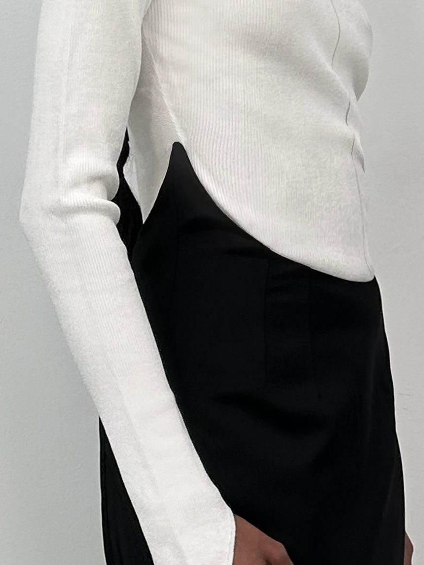 HIGH-WAISTED CRESCENT MINI SKIRT